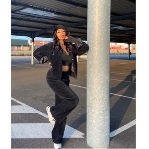 Black corduroy pants with bucket hat